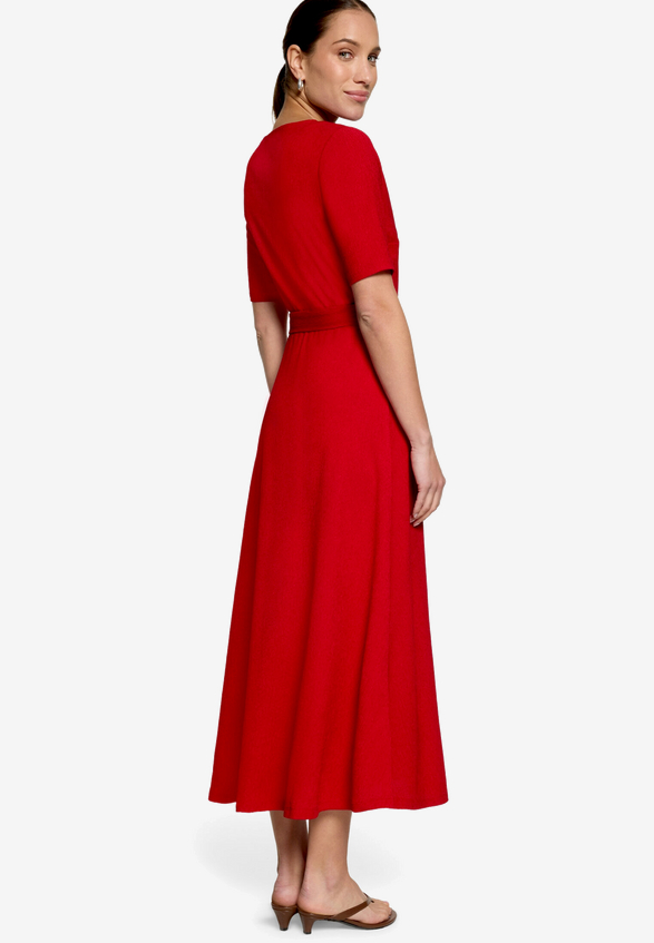 Jerseykleid mit Gürtel / Modellfoto Rückseite