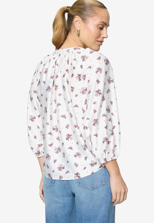 Schlupfbluse  mit Blumen / Modellfoto Rückseite